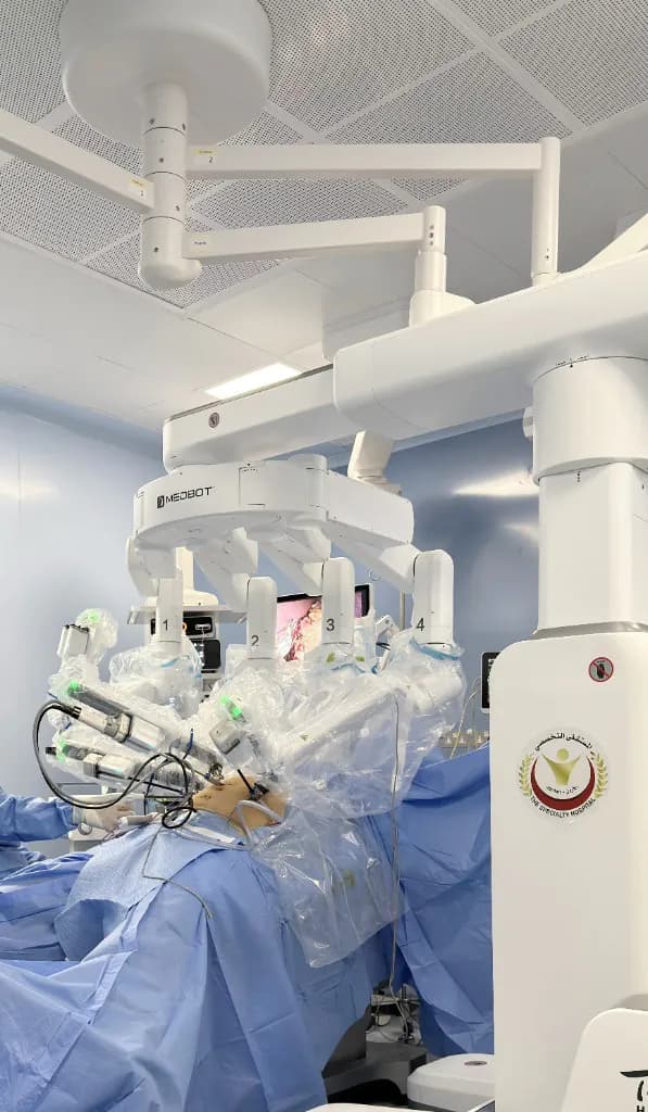 The four-arm Toumai surgical robot by MicroPort MedBot docked to the patient during Jordan's first robotic sleeve gastrectomy at the Specialty Hospital, Amman